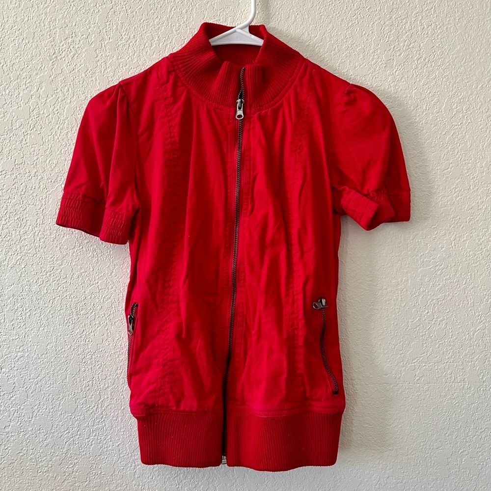 Red zipped up top